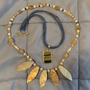 Set of Two Artist-Created Necklaces made from Beads, Shells, and Enamel Pendant